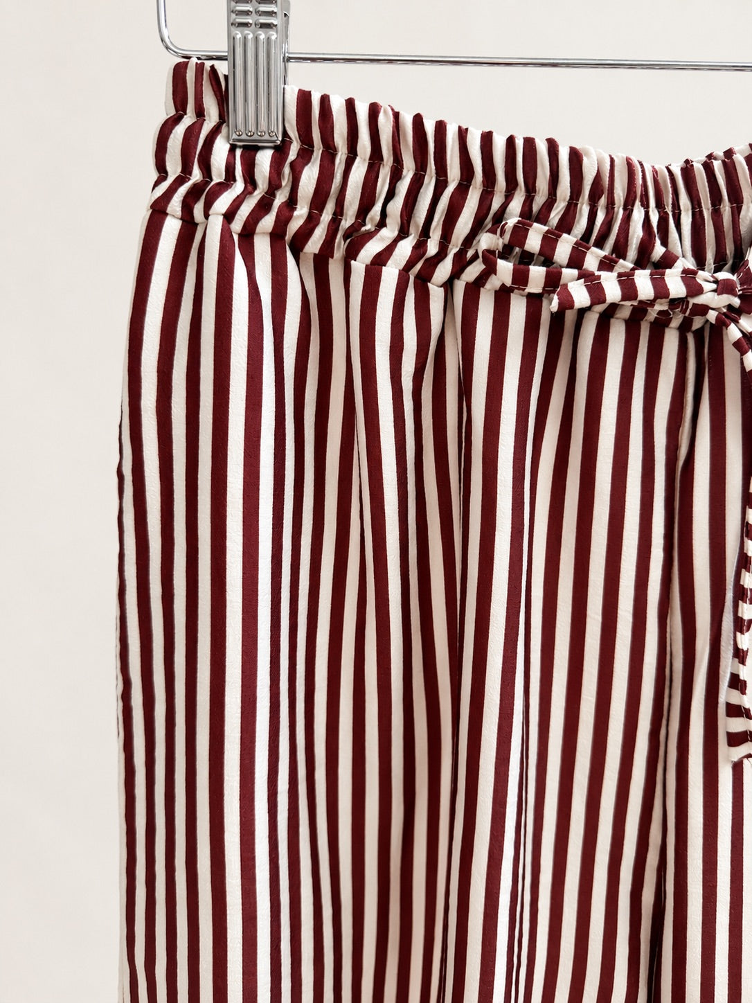 Pantalón a Rayas Fluido Rosa